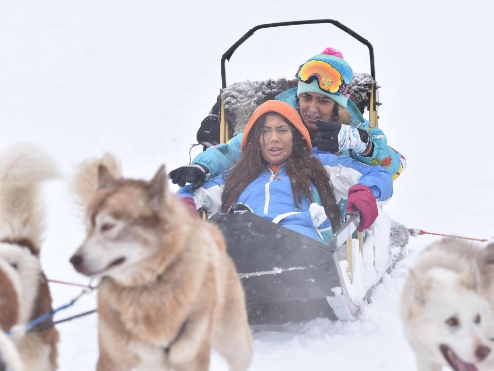  The girls climbed into the sleigh for the ride