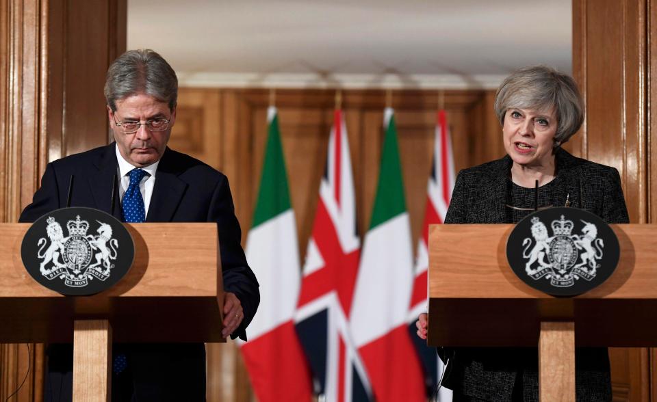  Mrs May used a press conference with the Italian PM to defend the decision to stop the scheme