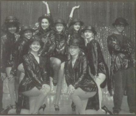  Meghan Markle (fourth from left) as a tap dancer in the Immaculate Heart High School school performance of British musical Stepping Out, in 1998