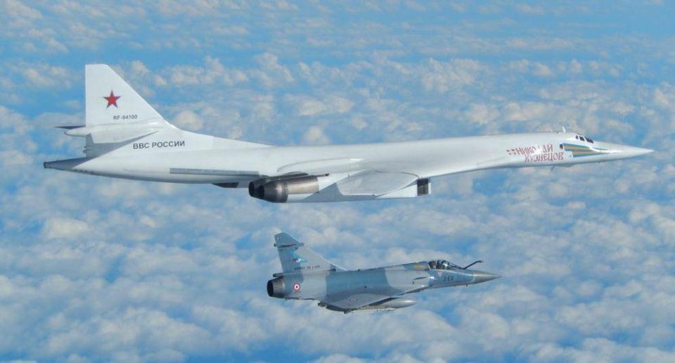  The French Rafale jets, bottom, were also scrambled to escort the Russian bombers