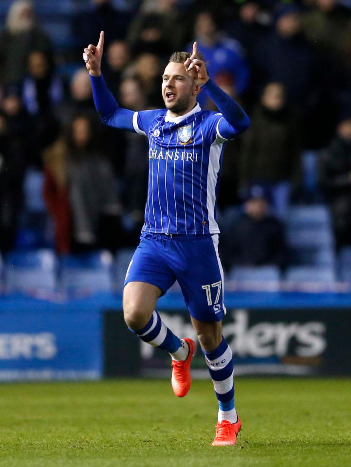  Rhodes then celebrated in front of his new fans after his headed goal