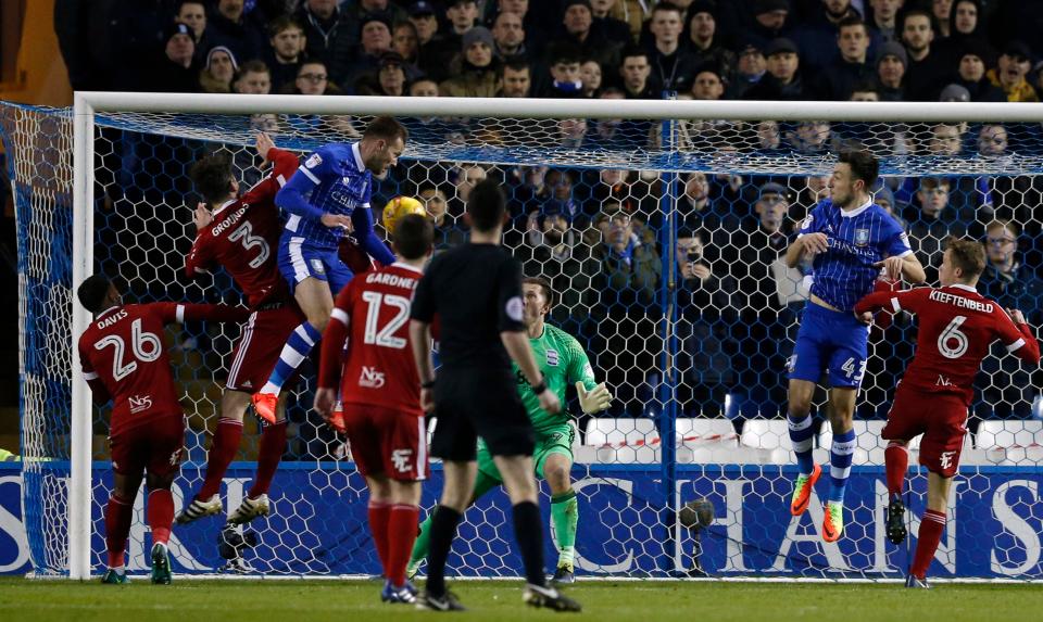  Jordan Rhodes' debut couldn't have started any better as he rose highest to put his new team Sheffield Wednesday into an early lead