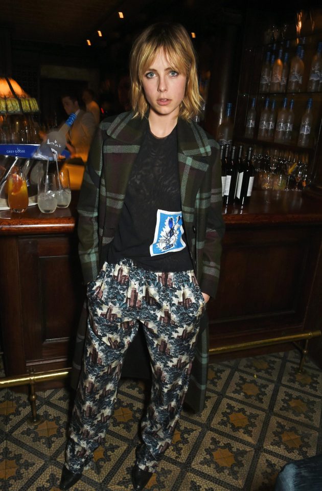  Edie Campbell wears an interesting clashing outfit