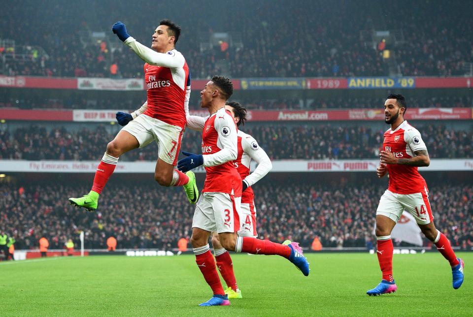  Alexis Sanchez scored with his hand to throw Arsene Wenger a lifeline