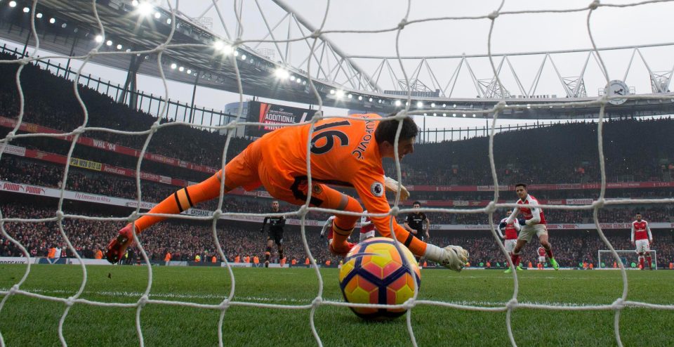  Alexis Sanchez makes it two as he scores from the penalty spot