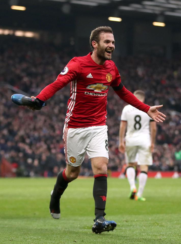  The Spanish midfielder wheels away after scoring his second in two games, taking off his boot as a celebration as he had only re-fitted it seconds earlier