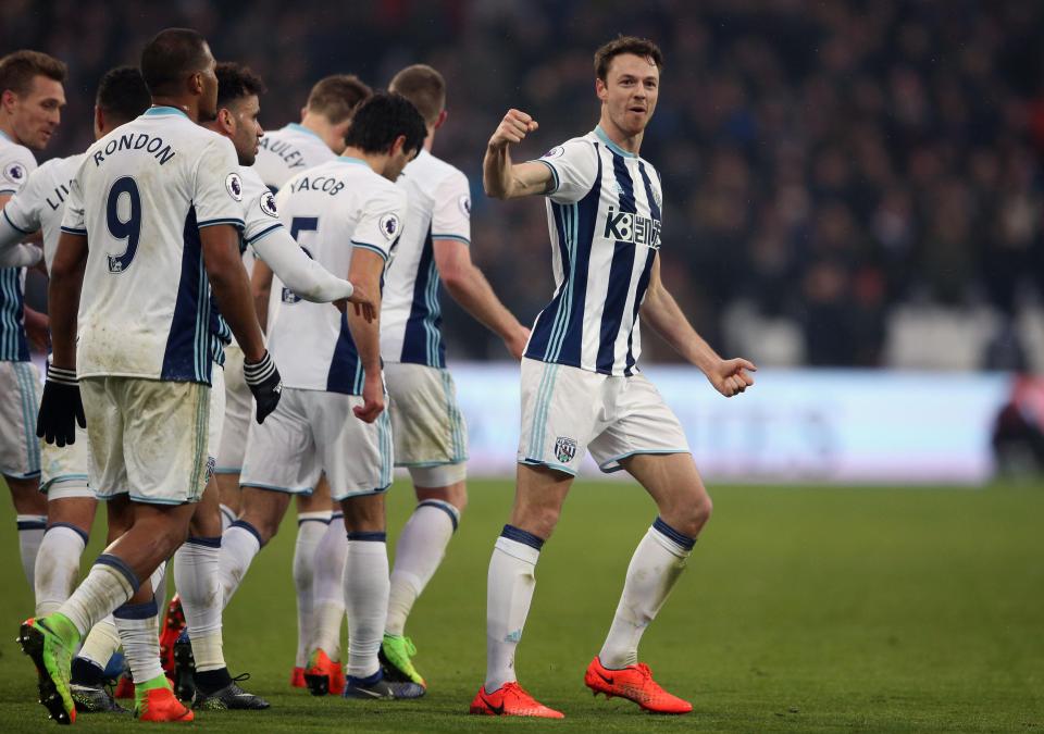  The former Man United man (right) celebrates