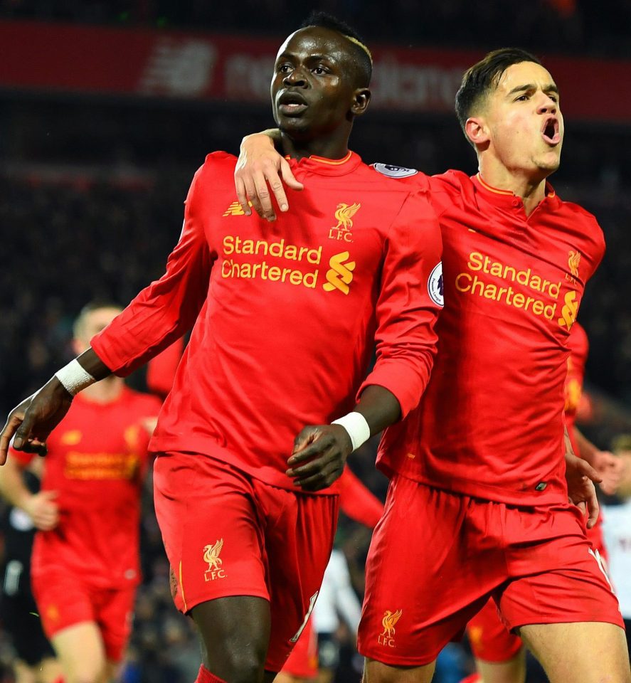  Coutinho celebrates Mane's goal with the man himself