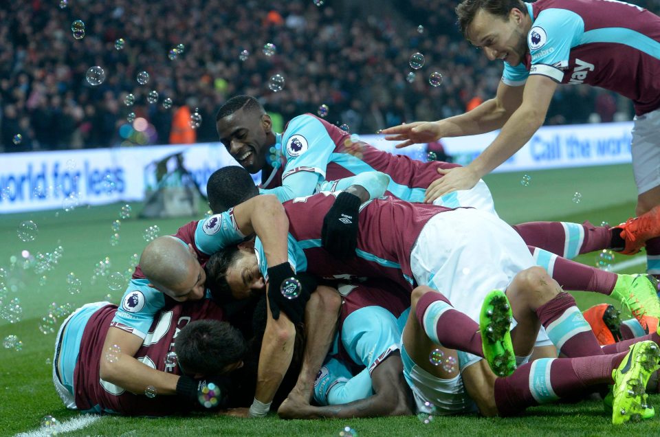  Manuel Lanzini was mobbed by his Hammers team-mates after they believed he scored the winner