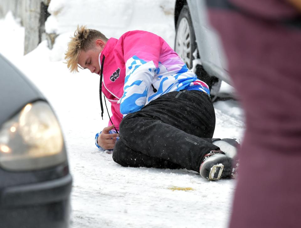  As the tummy bug took hold, Marty laid down on the snow