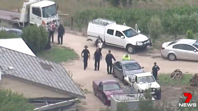  Cops at the farm in Australia where the Belgian backpacker was rescued after sending a message to her pal for help