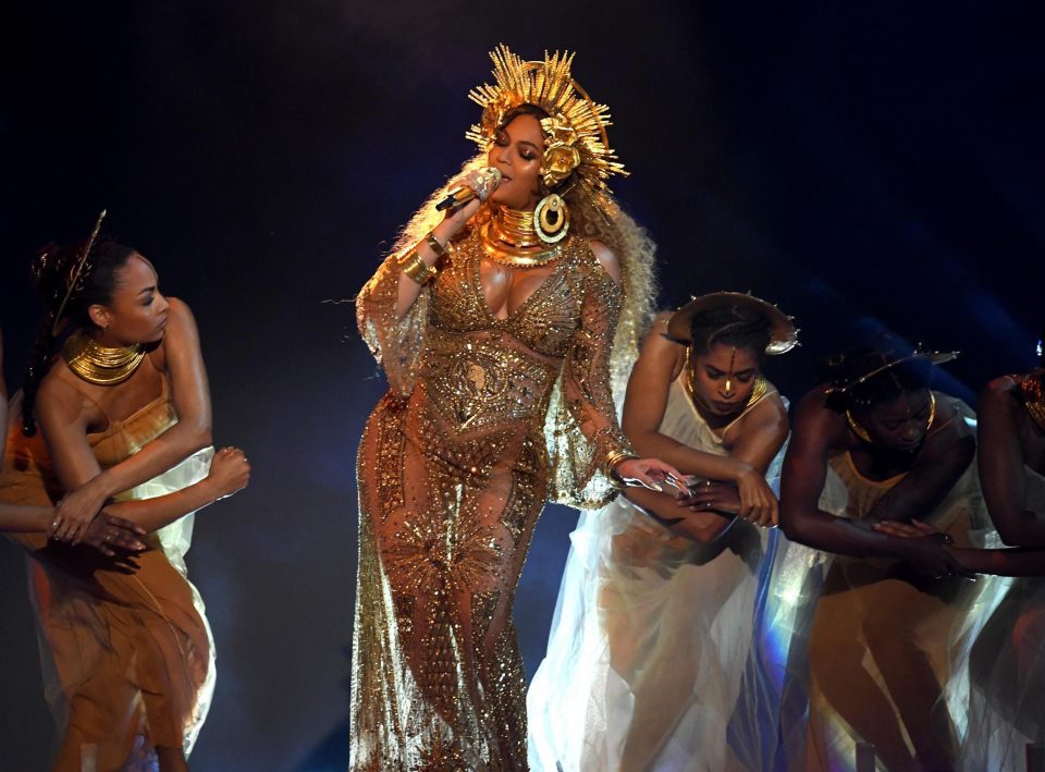  The singer looked stunning in a sheer and gold glittering gown