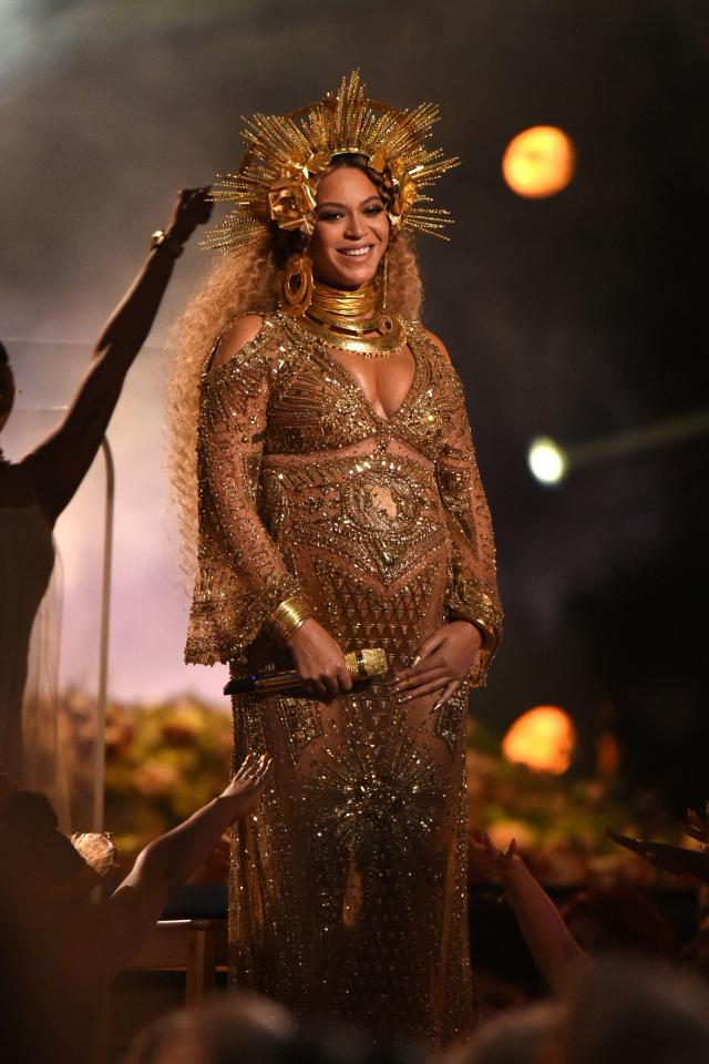  Beyonce wore an elaborate gold head dress with her gown