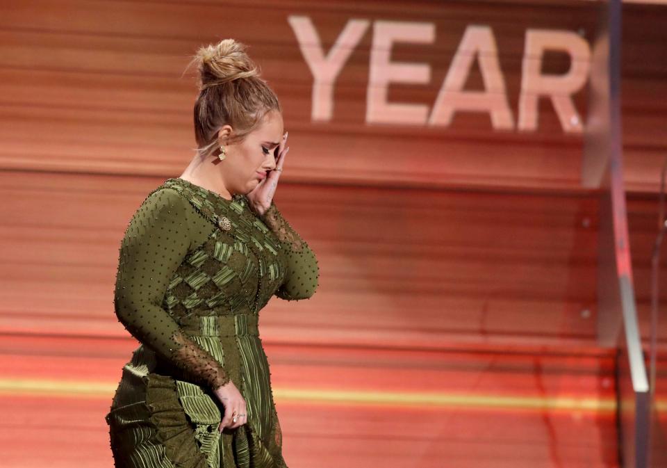  The emotional night saw Adele win five GRAMMYs including Album of the Year, Song of the Year and Record of the Year