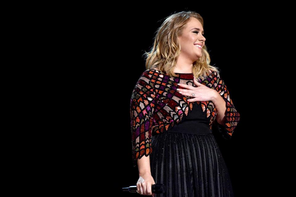  Adele showed off her ring at the bash