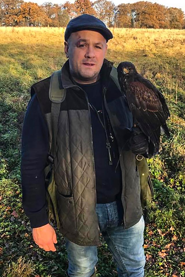  Kevin poses with one of the harrier hawks that he trains. Jo thought that is what her now-fiance was going to get a tattoo of