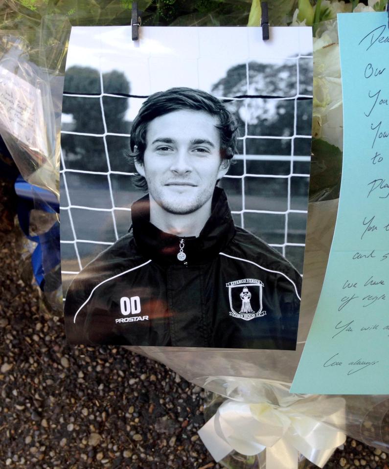  Photo of Dearlove left next to flowers in tribute to the 30-year-old after his death