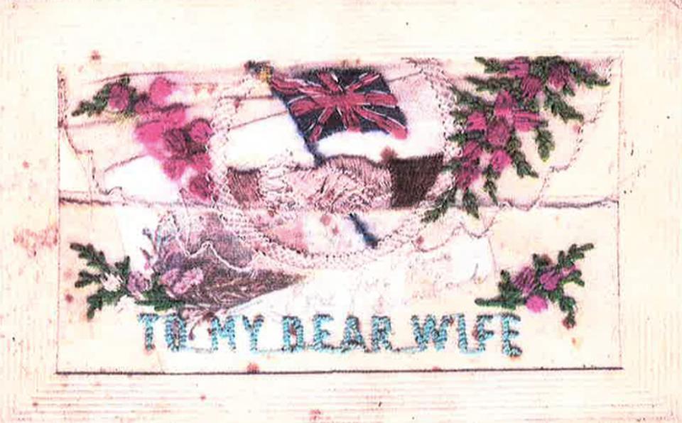  An embroided postcard from a soldier home to his "dear wife" is just one of the poignant mementos