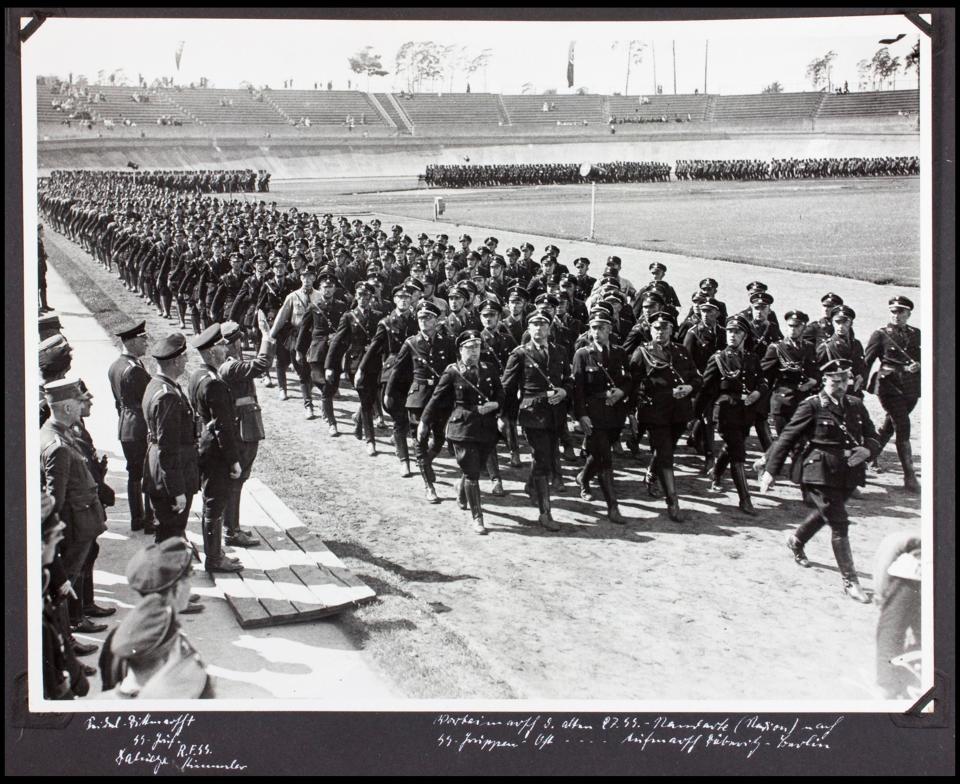  The album was recovered by US Army officer Philips Parks Ramsey after the war. pictured, SS soldiers on parade march