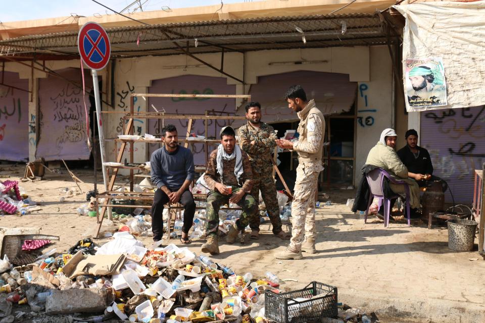  Fighters are seen in Tallabtah, the main base of operation for the Hashd al-Shaabi forces in the area