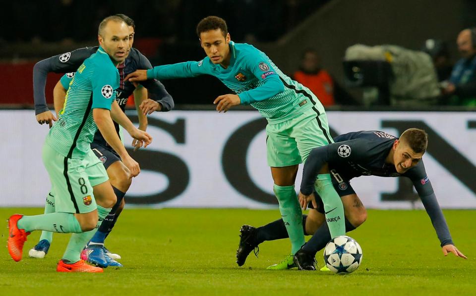  Verratti takes a tumble during a challenge with Neymar