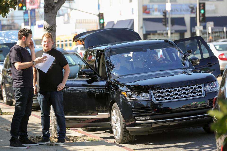  James was seen discussing the plan for the day's shoot with a crew member