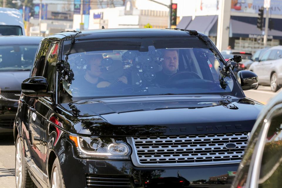  Ed and James looked ready for action as they sat in the camera-filled car