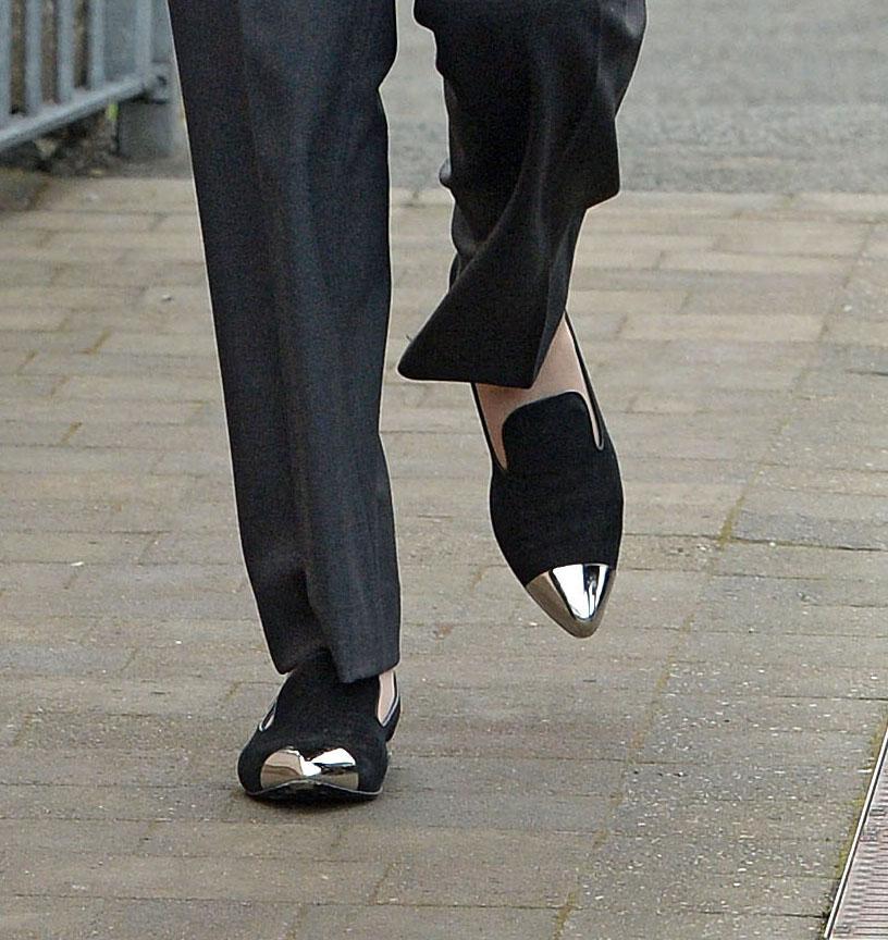  But the PM skipped free wearing suede shoes with gold toes and heels