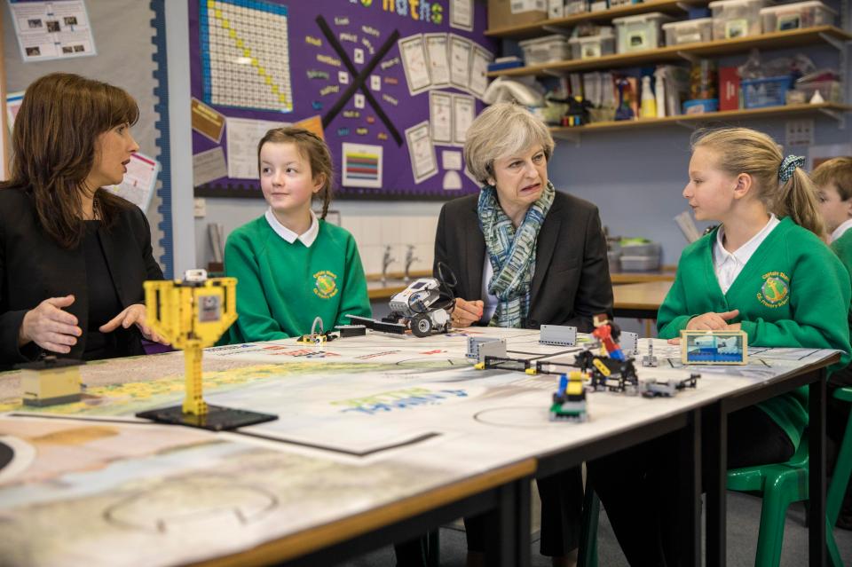  The prime minister was snapped grimacing on a visit to a primary school in Cumbria