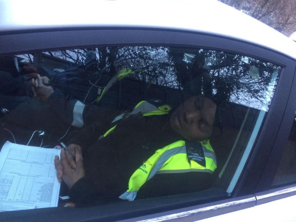  two civil enforcement officers were caught napping for around 50 minutes in their council-branded vehicle