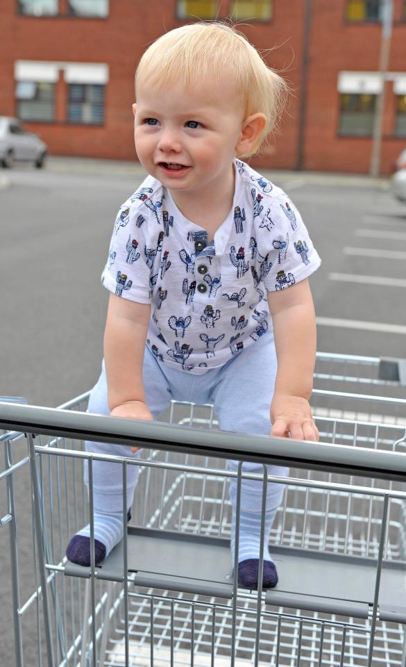 Stanley can be seen standing precariously in the trolley seat