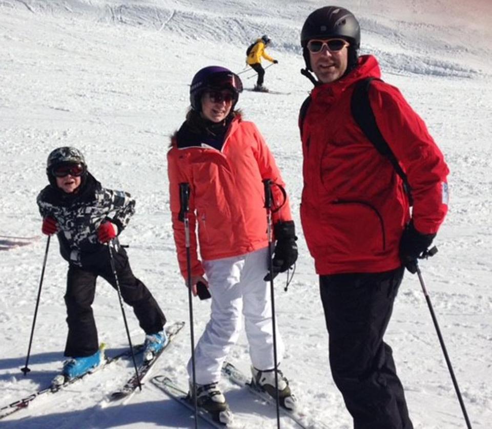  Louise was skiing with her husband Andy, right, and their kids Darcy, centre, and Archie, left, when the accident happened