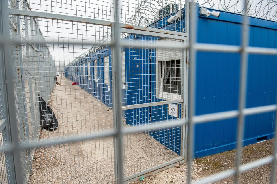  Refugees are held at the village of Röszke in container-like huts behind towering fences