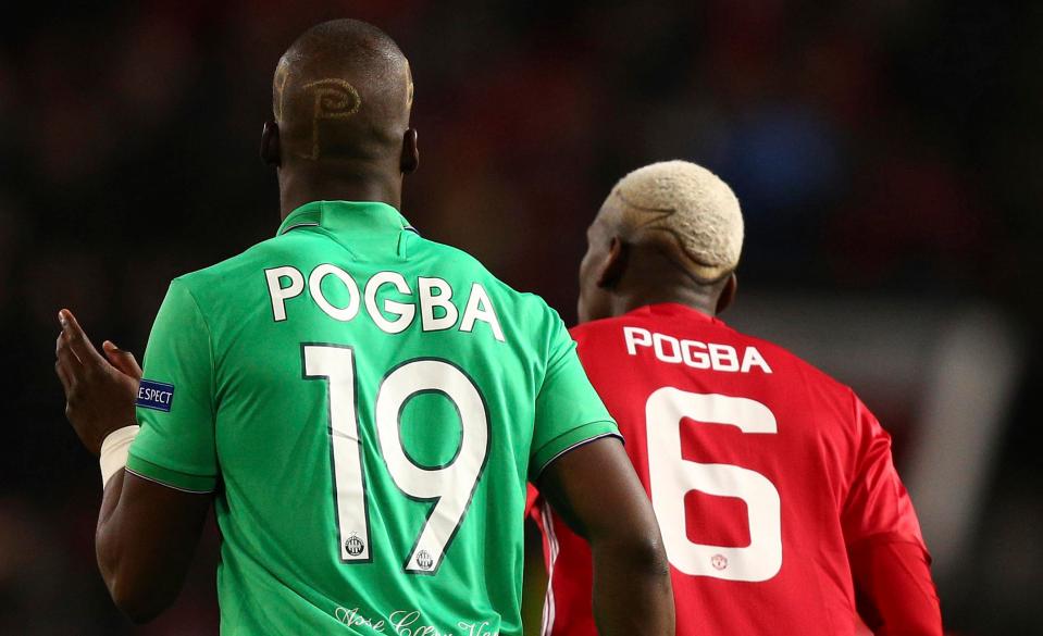  The Pogba brothers have a quick chat during the match