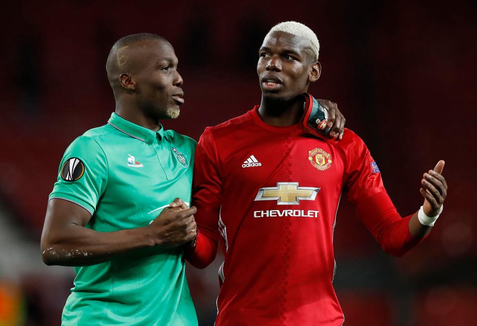  The Pogba brothers embrace at the final whistle