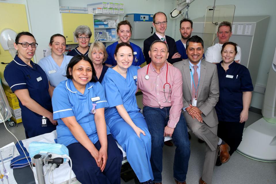  Ray's lifesavers included, back row, from left: Kelly Fee, ward manager, cardiology; Vicki Banner, senior healthcare assistant, and Kim Bull, manager, Cardiac Catheterisation Suite; Jo Wright, junior sister; Joanna Pingriff, senior staff nurse, Cardiac Catheterisation Suite; Dr David Smith, consultant cardiologist; Brian Caldwell, specialised cardio physiologist; and Christopher Bishop, radiologist; and front row, from left; Leilaini Alejandrino, staff nurse, cardiology; Janet Kelly, staff nurse; Dr Deepak Goyal, consultant interventional cardiologist; and Clare Alexander, matron, cardio-respiratory medicine