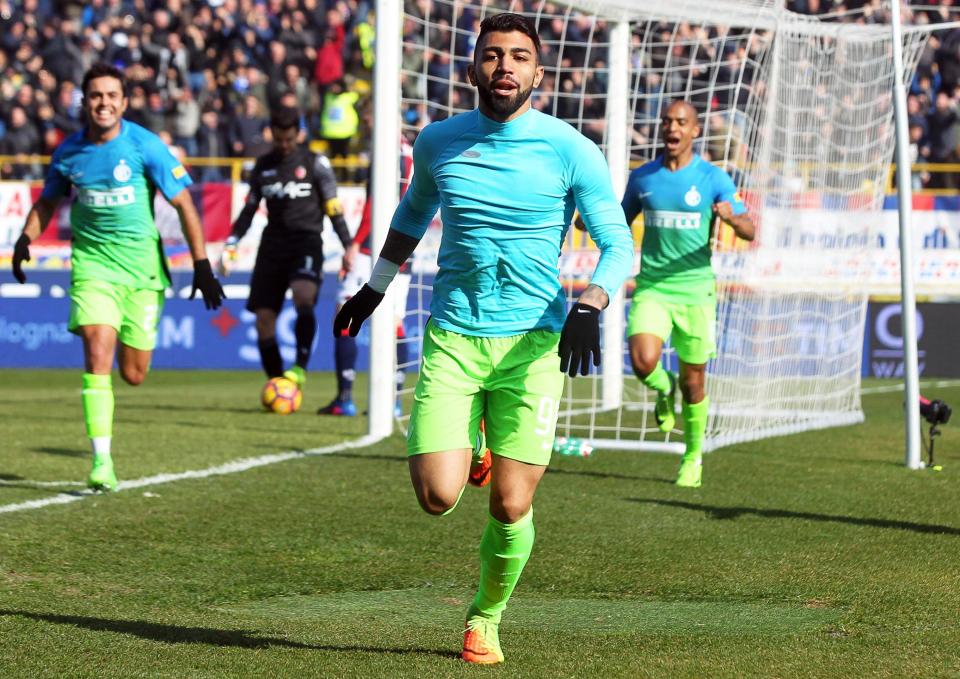 Gabriel Barbosa takes his shirt off in celebration after netting late winning goal