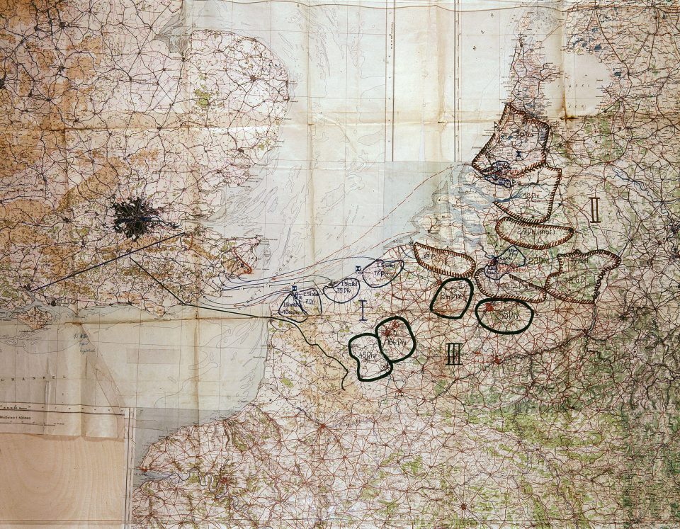  German plans for the invasion were hastily drawn on to maps by soldiers awaiting the order to invade