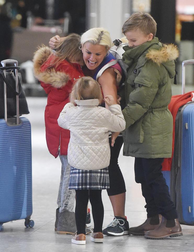  Kerry couldn't contain her excitement as she was reunited with her kids at Heathrow Airport