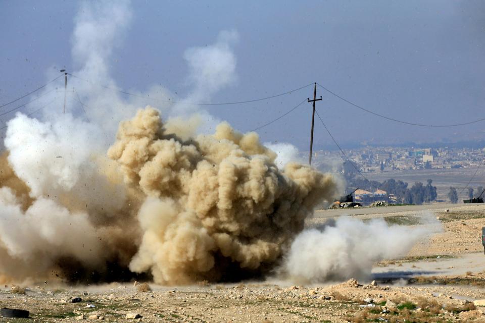  Smoke rises after an explosion of an IED planted by Islamic States fighters in south of Mosul