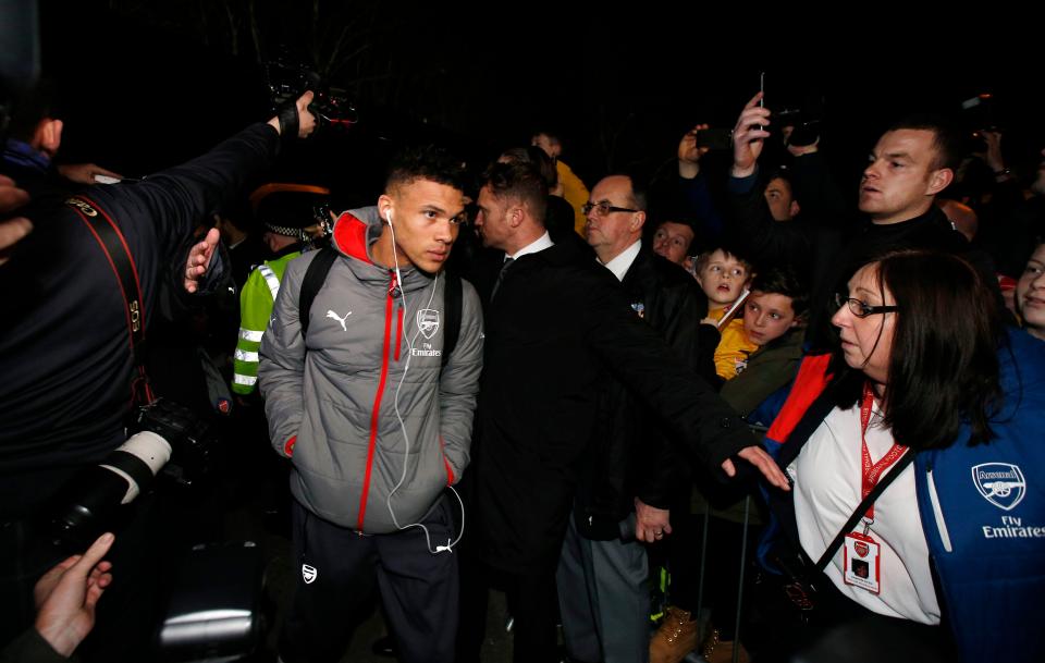 Kieran Gibbs on his way into Gander Green Lane stadium