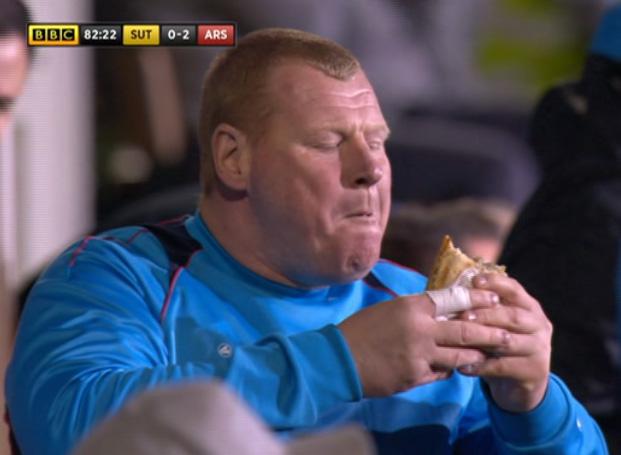  The keeper looked down at his food as he had a mouthful