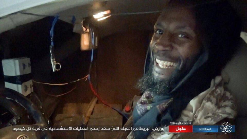  British ISIS fighter Abu Zakariya al-Britani smiles before killing himself in a suicide attack in Mosul