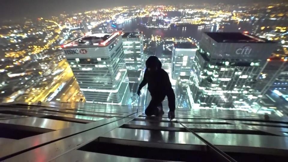 The pair sneak past security at Canary Wharf's tallest skyscraper