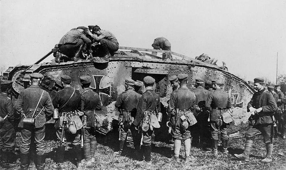  German troops familiarise themselves with an enemy tank now under new ownership