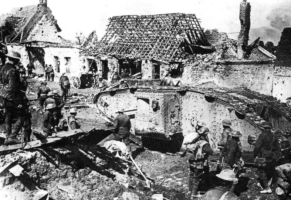  This Mark II male tank was photographed passing through the crumbling ruins of a French village in 1917