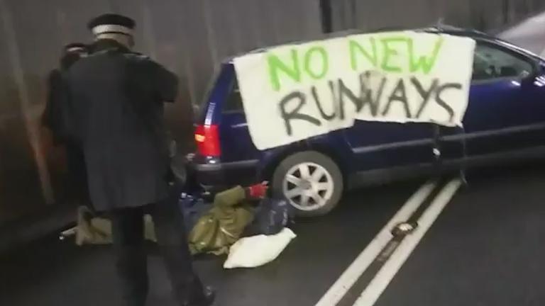 Five climate change protesters were arrested by police today