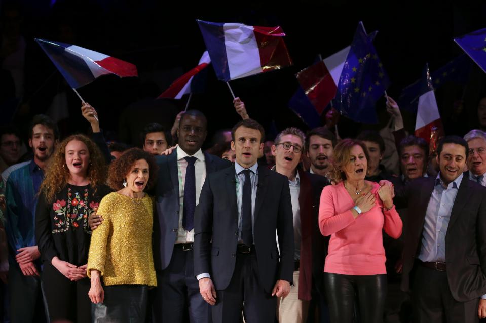  He stands on stage and sings at the end of the campaign event