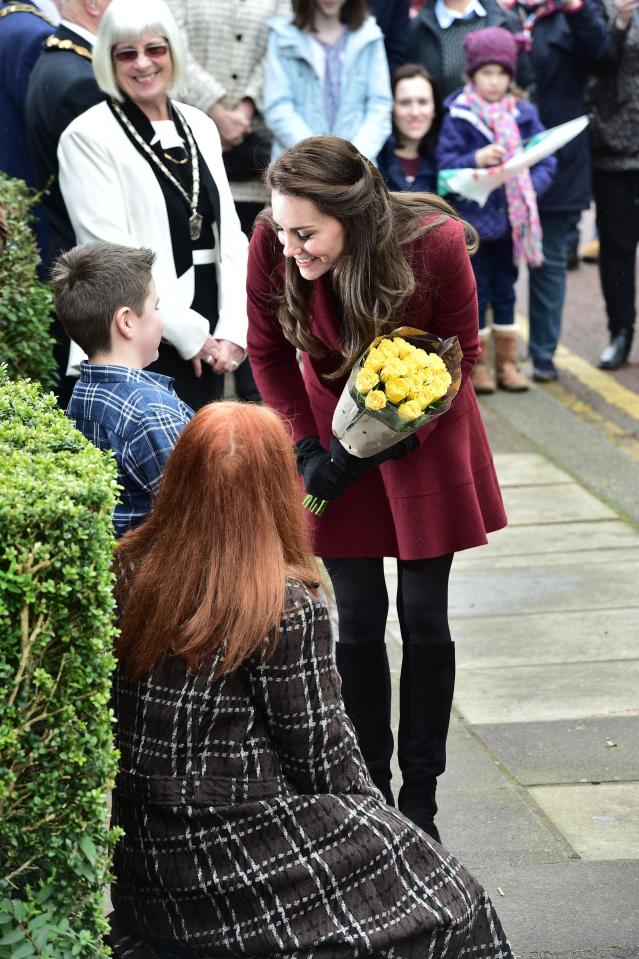  She sat in on a private session with some of the youngsters before being given posies of flowers