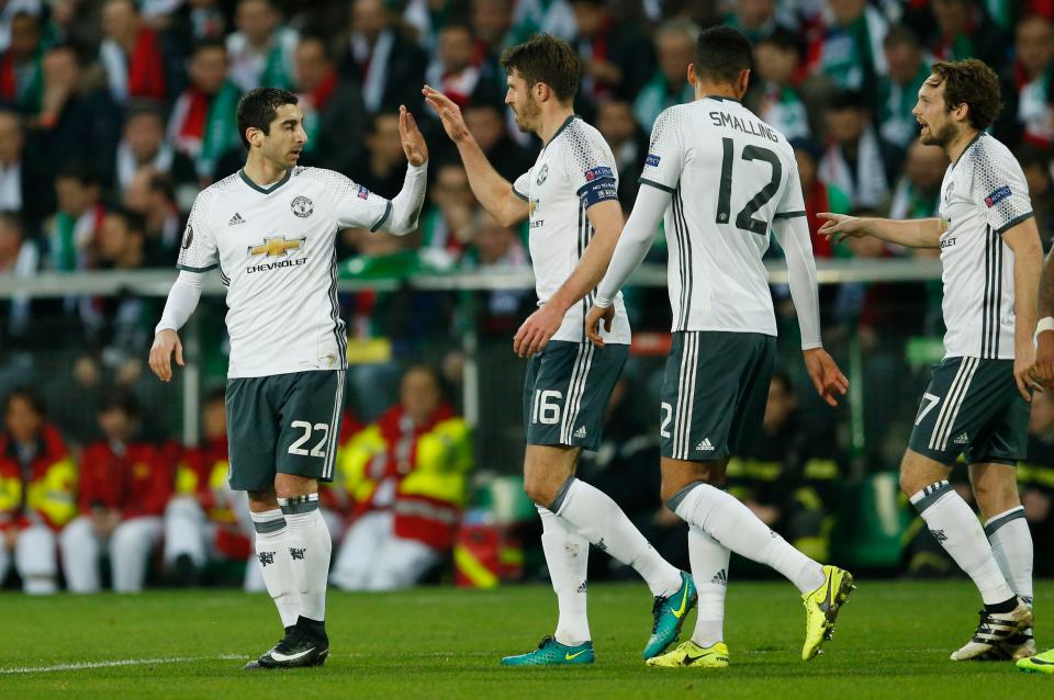  The Armenian midfielder celebrated after nudging home Juan Mata's inviting cross